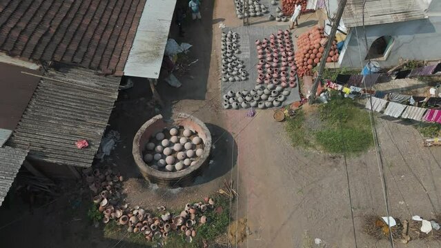 Aerial view of potter maker work shop in small village.