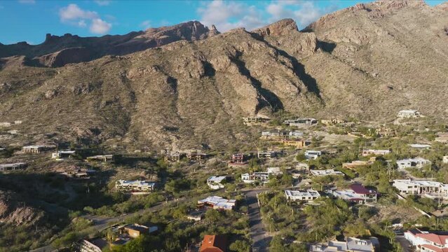 Flying Over Catalina Foothills and Stunning Mountains with Peaceful Neighborhood in Tucson Arizona on Sunny Clear Day