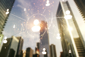 Double exposure of abstract virtual social network icons on modern skyscrapers background....