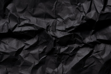 Crumpled and folded Black Paper Texture for background