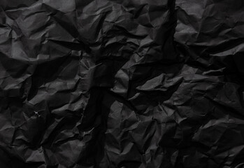 Crumpled and folded Black Paper Texture for background