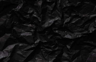 Crumpled and folded Black Paper Texture for background