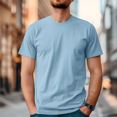Man in the light blue T-shirt standing outdoor, sunny day, in the style of Shirt mockup, Copy space advertising concept