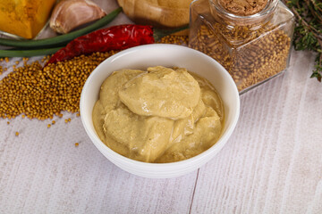 Dijon mustard sauce in the bowl