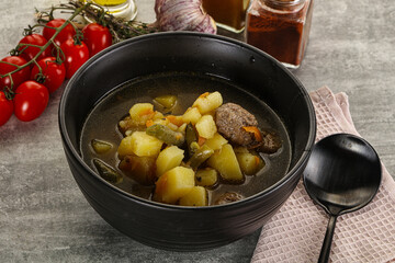 Soup with meatball and potato