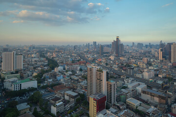 Fototapeta premium Aerial view of Bangkok Downtown Skyline, Thailand. Financial district and business centers in smart urban city in Asia. Skyscraper and high-rise buildings.