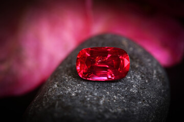 Shiny red and yellow diamond on glass, surrounded by romantic elements like heart, candle, and...