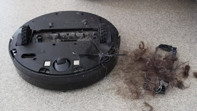 Cleaning hair out of robot vacuum