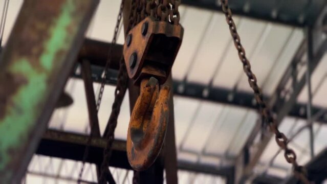 Close up,cinematic mode. Rusty hook on the crane?trust bawa oleh2 gak?