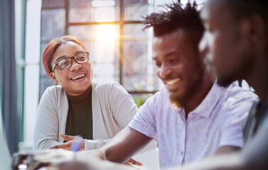 Successful african american business team talking about strategy at office