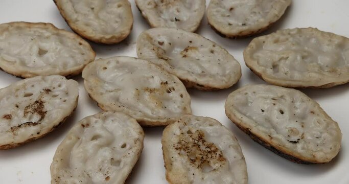 Fluffy ground rice powder pancake Bengali chitoi Dhaka  Chikui  Sora pitha on white background