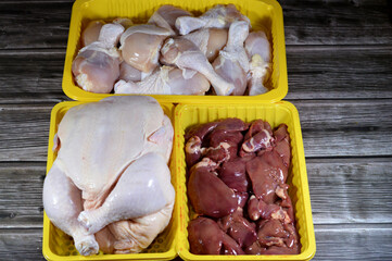Fresh Raw chicken legs drumsticks hindquarter, raw full chicken with skin and bones and fresh...