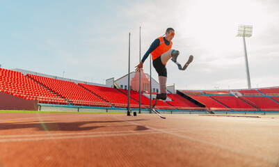 Asian para-athlete runner inspiration prosthetic leg on the track alone outside on a stadium track...