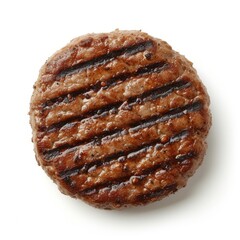Top view of a grilled beef burger patty on white background