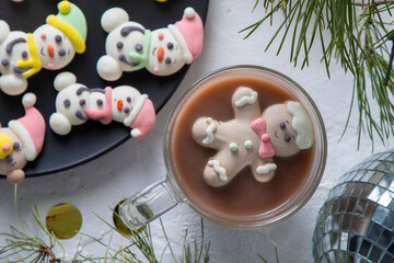 Christmas marshmallows. Winter candy. Sweet food in december. Snowman and Santa Claus