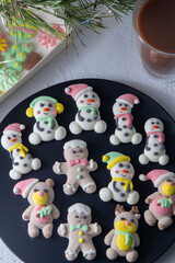 Christmas marshmallows. Winter candy. Sweet food in december. Snowman and Santa Claus