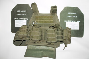
Body armor with plates on a white background.