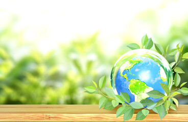 Horizontal banner with Earth in glass ball on green leaves. Ecology, go green concept. Environmental and conservation protection background. Sunny summer backdrop with globe and plants. 3d render