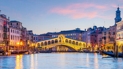 Panoramic view of famous Canal Grande with famous Rialto Bridge at sunset, Venice - 728270450