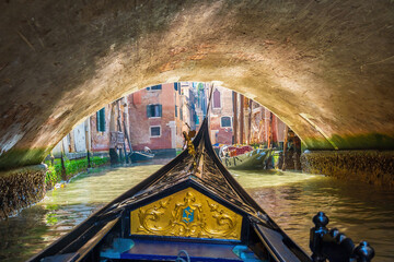 Venice cityscape and canal with gondola ride - 728270601