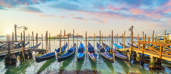 Venice cityscape and canal with gondolas - 728270654