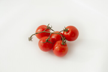 Red tomatoes on an isolated background