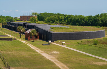 Fototapeta na wymiar Fort Moultrie, small fortifications and ammunitions bunkers that run along the coast of Sullivan's Island, South Carolina