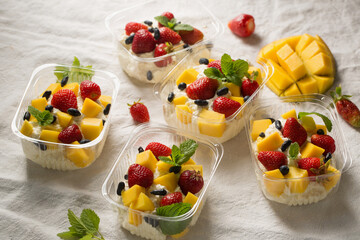 Portion containers with cottage cheese dessert for a picnic
