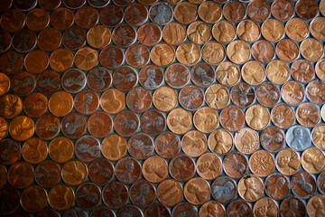 Hundreds of pennies fill the frame