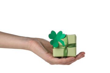 PNG, Gift box with clover in hand, isolated on white background