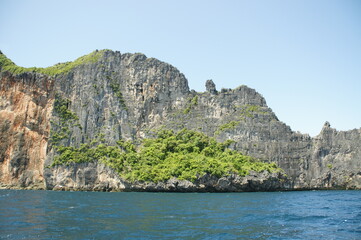 Fototapeta na wymiar Beautiful limestone cliff rocks structure in Koh Phi Phi Island Thailand.