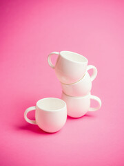 Fototapeta na wymiar cup of coffee and pink rose