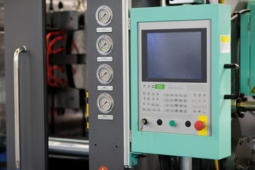 close up of plastic injection moulding machine