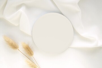 Round podium mockup for small products, jewelry display, elegant aesthetic background, top view.