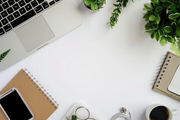 Office desk: Top view of various office supplies such as a laptop, a note pad, a coffee cup, a smartphone and a plant. 