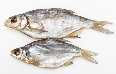 dried salted fish on white background.