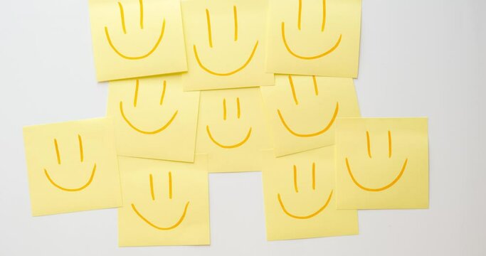 Yellow notes with smiles. 4K stop motion animation