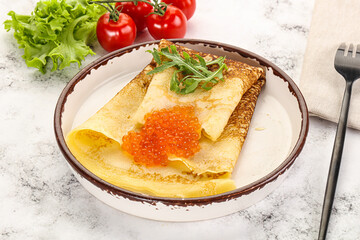 Russian pancake with red caviar