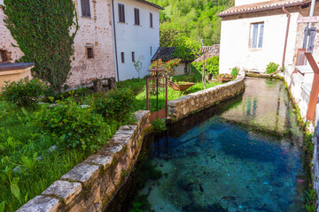 Fototapeta na wymiar Rasiglia in the province of Perugia, municipality of Foligno. The town crossed by the Menotre river.