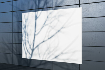 Creative outdoor dark tile wall with tree shadow and white mock up billboard. Urban design concept. 3D Rendering.