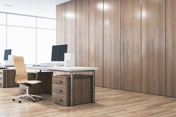 Side view of modern wooden office interior with furniture, equipment and window with daylight. 3D Rendering.