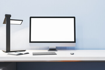 Close up of modern designer office interior with empty white computer monitor and other items. Mock up, 3D Rendering.