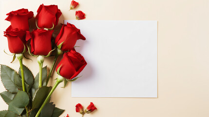 Blank paper card and red rose flowers background