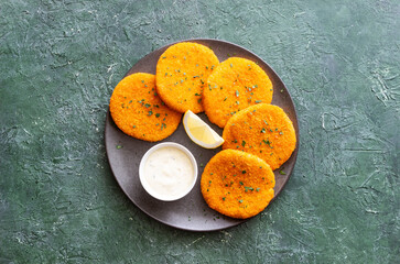 Fish cakes with white sauce and lemon. Seafood. Healthy eating.