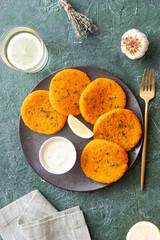 Fish cakes with white sauce and lemon. Seafood. Healthy eating.