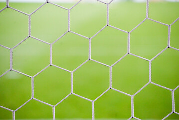 Soccer goal net on a soccer field.