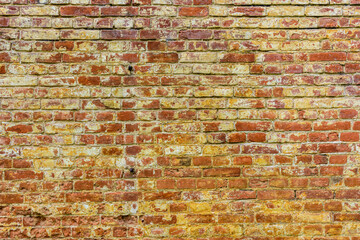 Old wall of red bricks for the background
