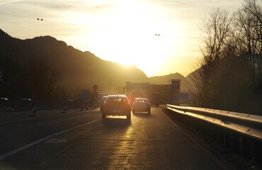 Backlighting in road traffic. Difficult visual conditions due to the glare of the sun
