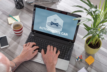 Autonomous car concept on a laptop
