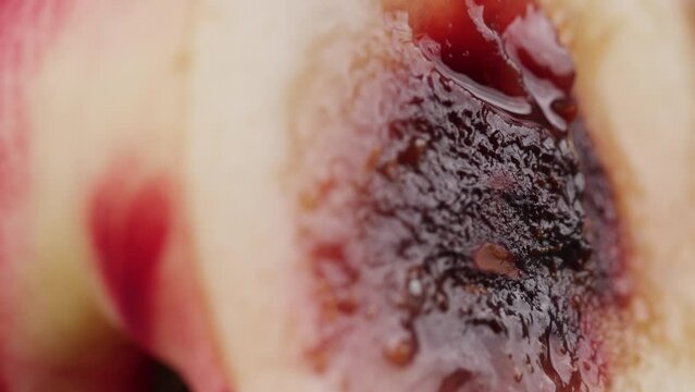 Sliced nectarine in extreme close-up